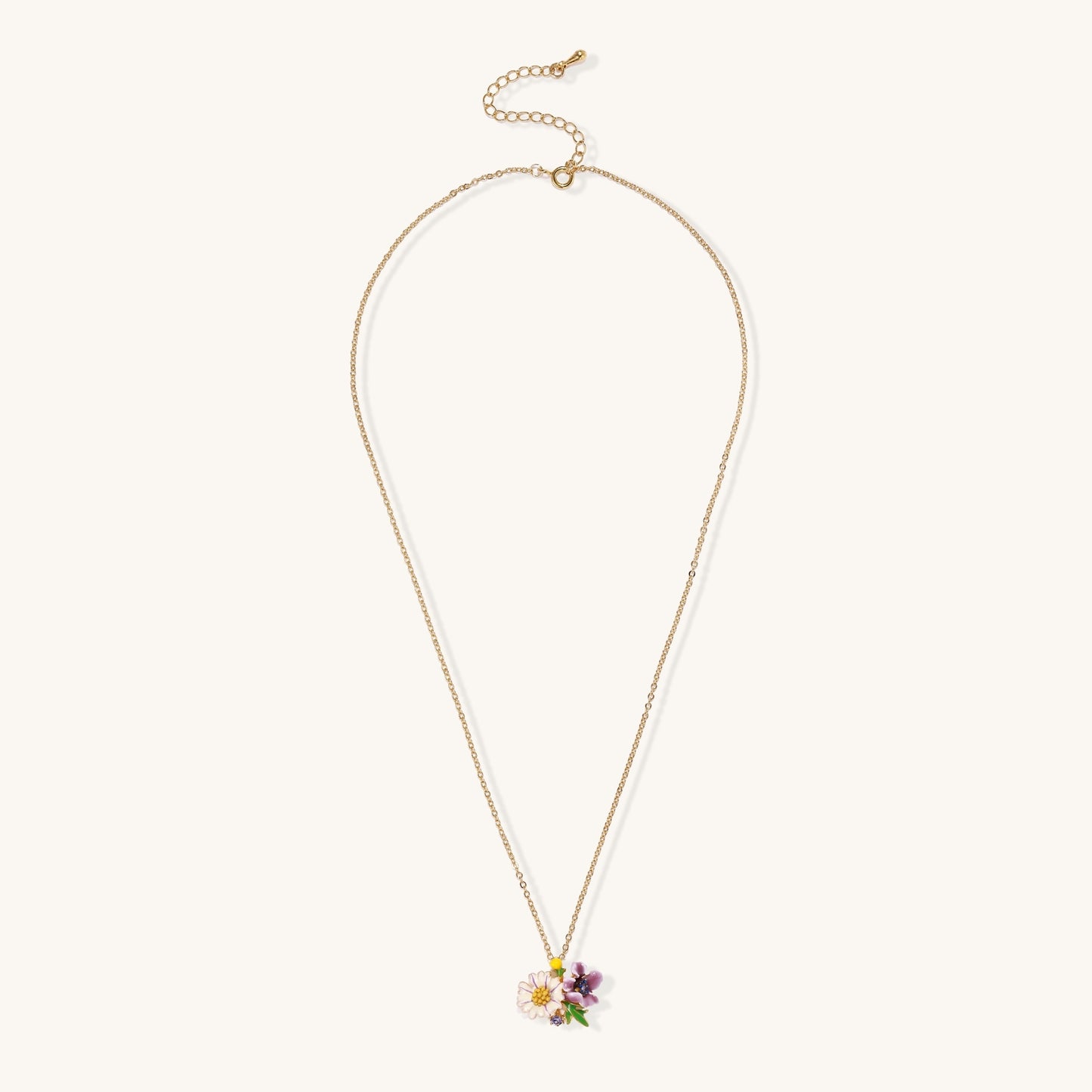 Delicate 18K gold plated necklace featuring colorful enamel flowers in pink and white with green leaves on chain