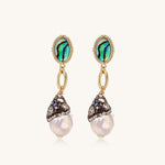 Gold-plated statement earrings with iridescent abalone shells, rope chain links, and crystal-capped baroque pearls