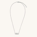 Delicate 14K gold plated chain necklace with crystal-accented carabiner-style pendant on white background