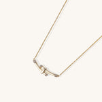 Elegant 14K gold plated necklace featuring two curved bars with diamond accents on adjustable chain