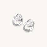 Gold-plated brass stud earrings with swirled circular design holding white freshwater pearls and small crystals