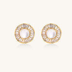 Gold-plated stud earrings with central freshwater pearl surrounded by baguette crystals in radial pattern