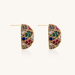 Oval gold-plated stud earrings with multicolor zirconia stones in geometric diamond pattern on white background.