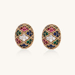 Oval gold-plated stud earrings with multicolor zirconia stones in geometric diamond pattern on white background.