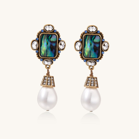Gold-plated brass drop earrings featuring iridescent abalone shell centers, crystal accents, and white pearl drops.