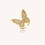 Adjustable gold-plated brass butterfly ring with intricate filigree cutout patterns and cubic zirconia accents on white background.