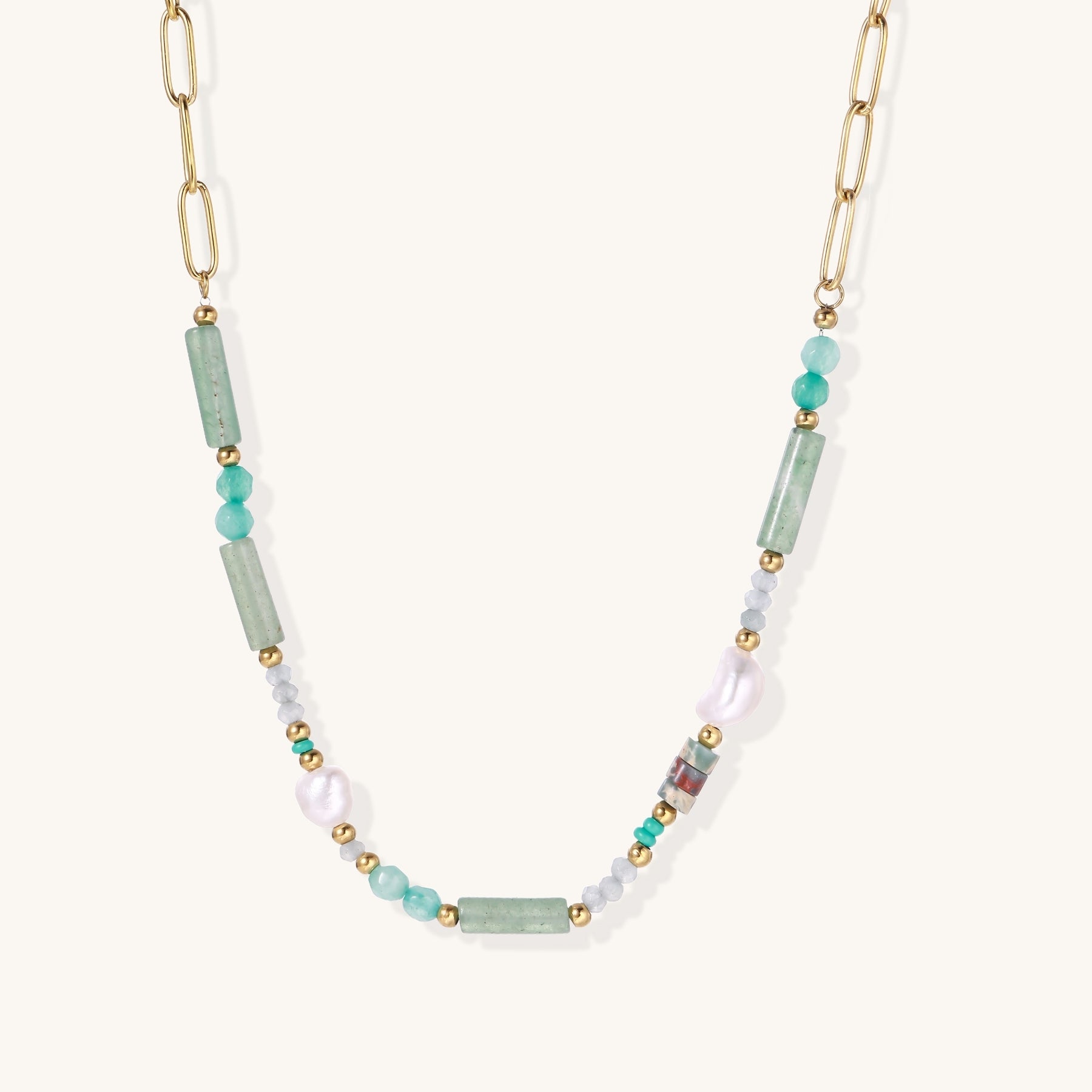 Gold-plated chain necklace with green prasem quartz, freshwater pearls, and mixed beads in modern asymmetrical design