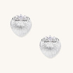 Pair of gold-plated heart-shaped earrings with vertical ribbed texture and sparkling zirconia stones at top on white background.