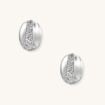 Oval gold-plated brass hoop earrings with cracked zirconia crystal pattern detail on neutral background.