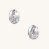 Oval gold-plated brass hoop earrings with cracked zirconia crystal pattern detail on neutral background.