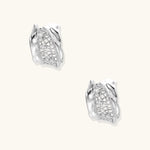 Small gold-plated brass hoop earrings with geometric lattice pattern and zirconia accents on white background.