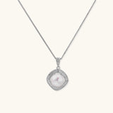 Cushion-shaped double halo pendant with 10mm freshwater pearl center on rhodium-plated sterling silver chain