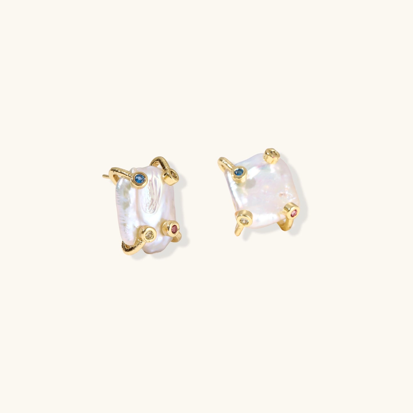 Baroque pearl studs in gold-plated prong setting with four multicolor gemstones on each corner, front and side view