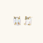 Baroque pearl studs in gold-plated prong setting with four multicolor gemstones on each corner, front and side view