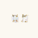 Baroque pearl studs in gold-plated prong setting with four multicolor gemstones on each corner, front and side view