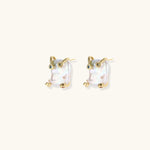 Baroque pearl studs in gold-plated prong setting with four multicolor gemstones on each corner, front and side view