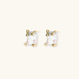Baroque pearl studs in gold-plated prong setting with four multicolor gemstones on each corner, front and side view