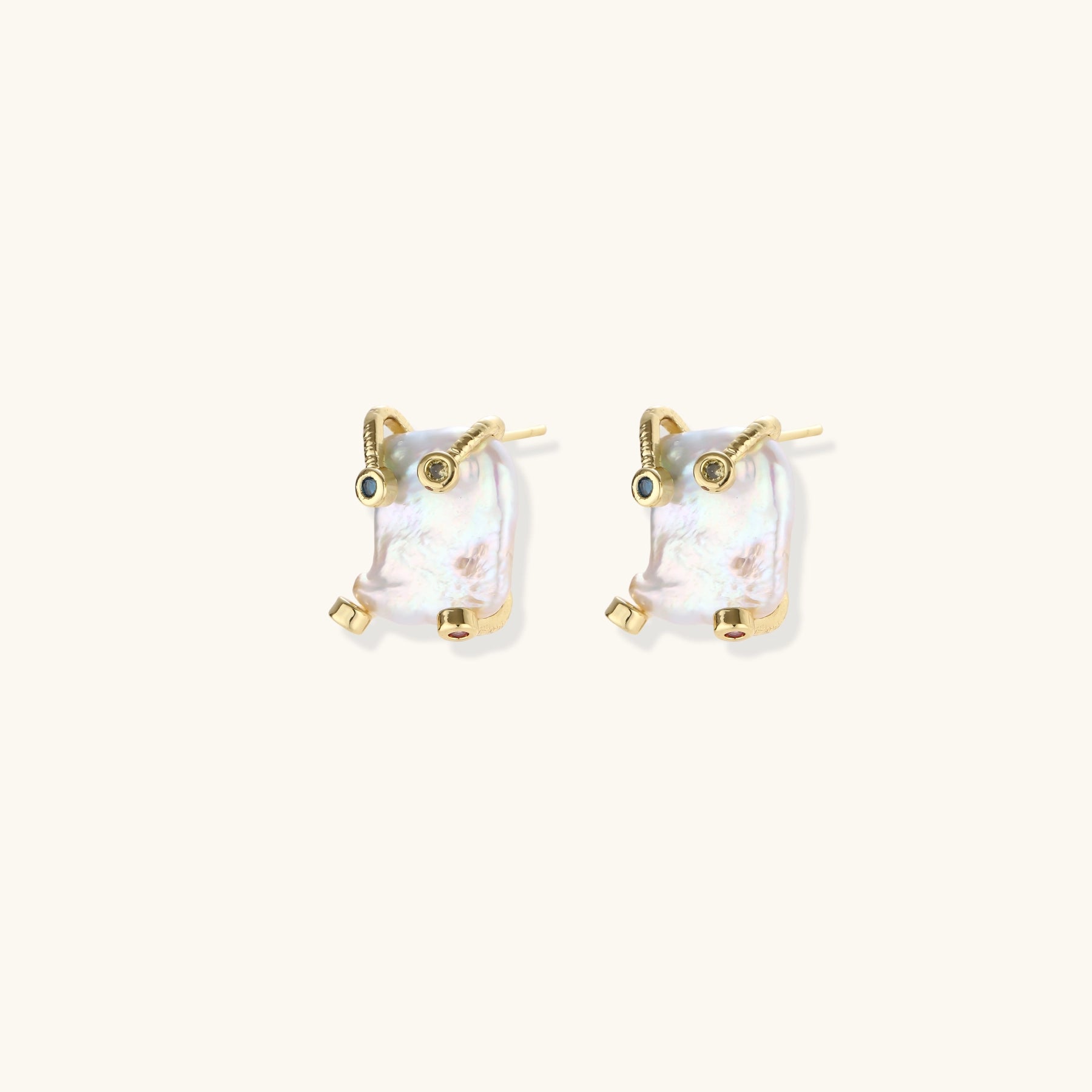 Baroque pearl studs in gold-plated prong setting with four multicolor gemstones on each corner, front and side view