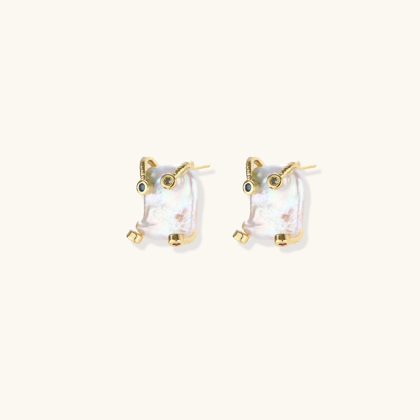 Baroque pearl studs in gold-plated prong setting with four multicolor gemstones on each corner, front and side view