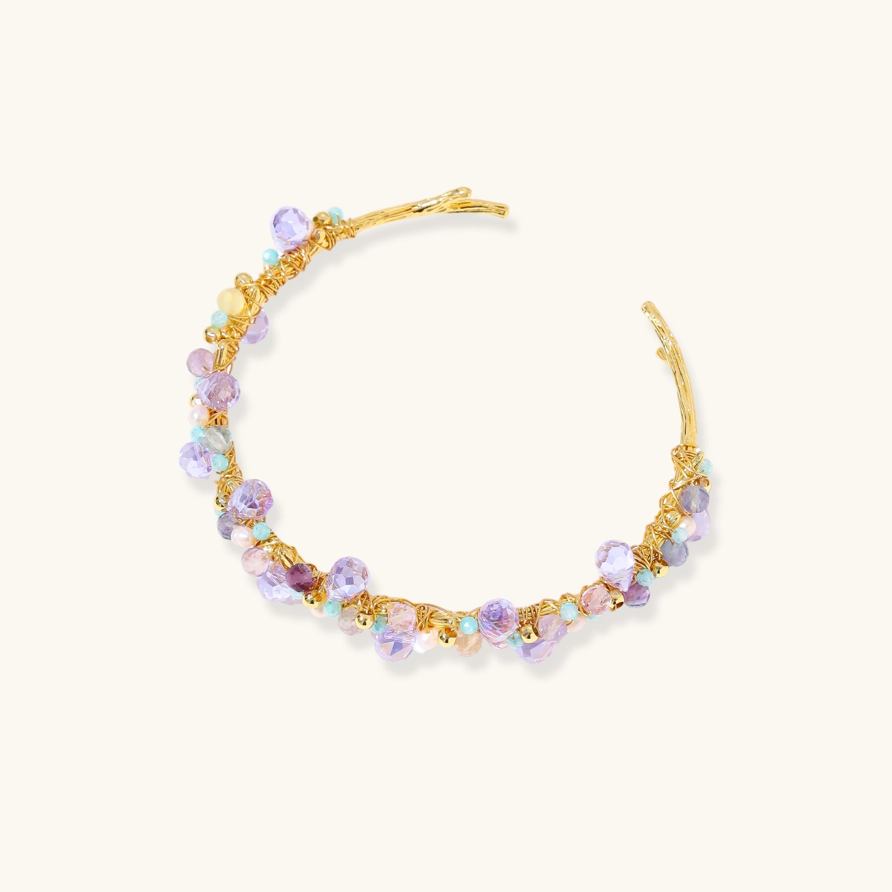 Gold-plated adjustable cuff bracelet with clustered lavender fluorite, turquoise beads, and freshwater pearls on white background.