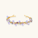 Gold-plated adjustable cuff bracelet with clustered lavender fluorite, turquoise beads, and freshwater pearls on white background.
