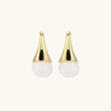 Pair of small gold-plated hoop earrings with triangular cone fronts and curved backs on white background.