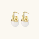 Pair of small gold-plated hoop earrings with triangular cone fronts and curved backs on white background.