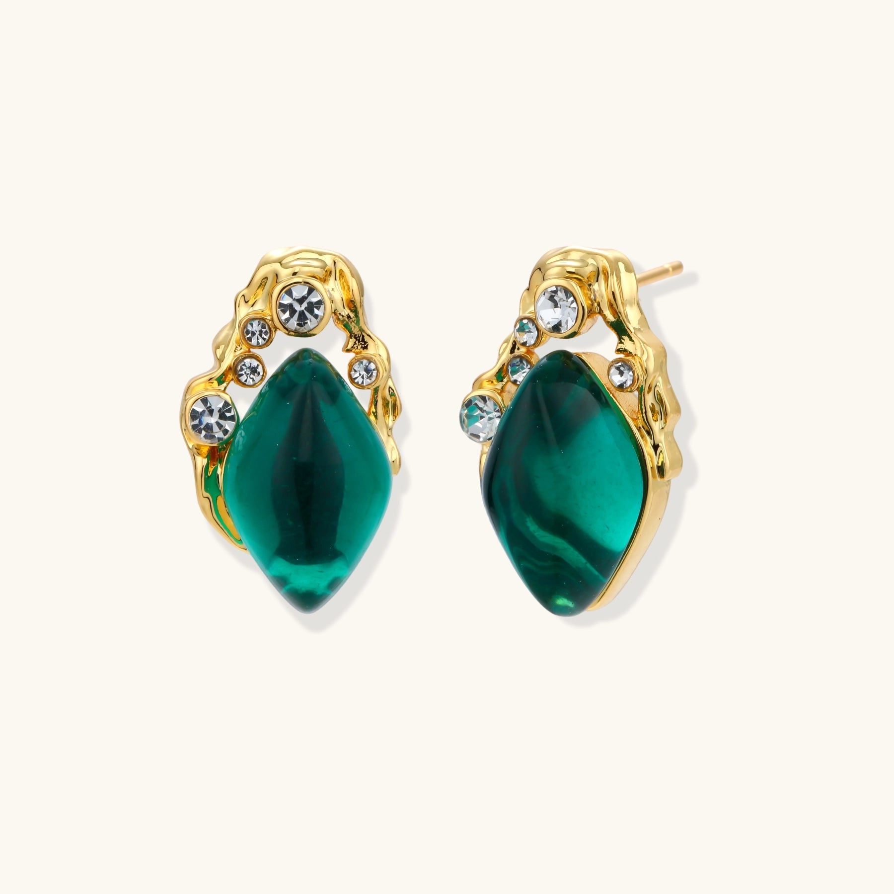 Gold-plated stud earrings featuring teardrop emerald green liuli stones with cubic zirconia crystal accents on white background.