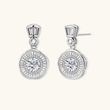 Art Deco-inspired sterling silver drop earrings with tiered moissanite stones in geometric sunburst design