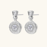 Art Deco-inspired sterling silver drop earrings with tiered moissanite stones in geometric sunburst design