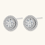 Double halo sterling silver stud earrings with brilliant round moissanite center stones and pavé crystal accents