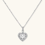 Sterling silver heart pendant necklace with brilliant moissanite center stone and halo setting on delicate chain