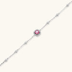 Elegant sterling silver chain bracelet featuring pink moissanite center stone in cushion halo setting with adjustable clasp