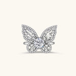 Sterling silver butterfly ring with central moissanite and baguette-cut stones forming intricate wing patterns