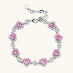 Pink heart-shaped cubic zirconia jewelry set with white gold plating featuring necklace, earrings, bracelet and ring