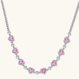 Pink heart-shaped cubic zirconia jewelry set with white gold plating featuring necklace, earrings, bracelet and ring