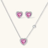 Pink heart-shaped cubic zirconia jewelry set with white gold plating featuring necklace, earrings, bracelet and ring