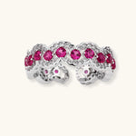 Ornate adjustable ring with pink cubic zirconia stones in white gold-plated copper setting with floral metalwork details